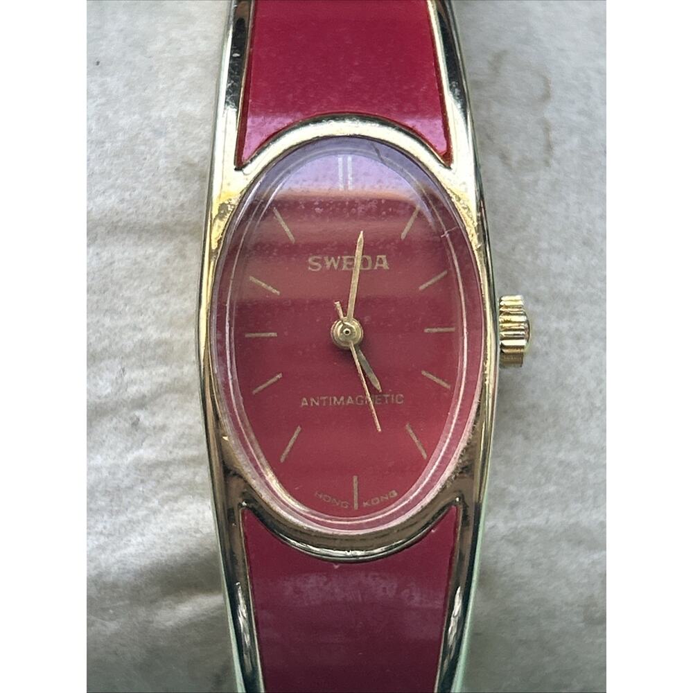 Sweda Antimagnetic Gold And Red Tone Women’s Wind Watch